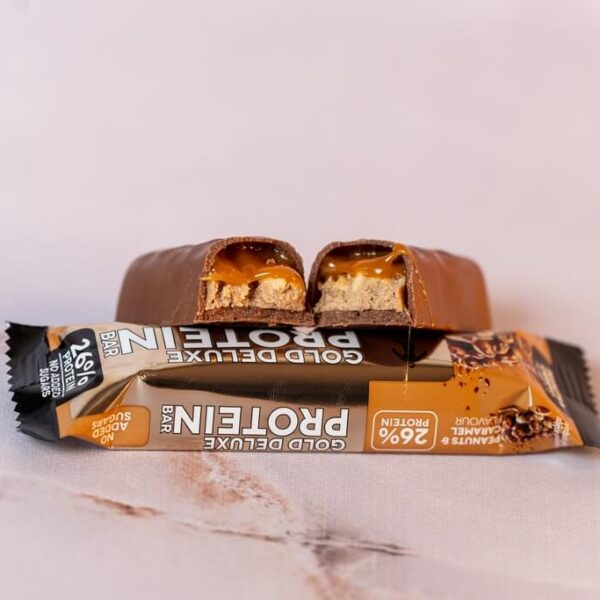 Piimashokolaadis valgubatoon karamelli täidise röstitud kookoshelvestega